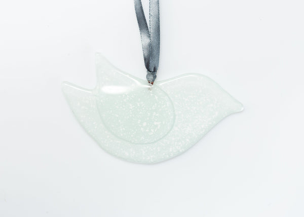 Mīlīgs balts stikla putns